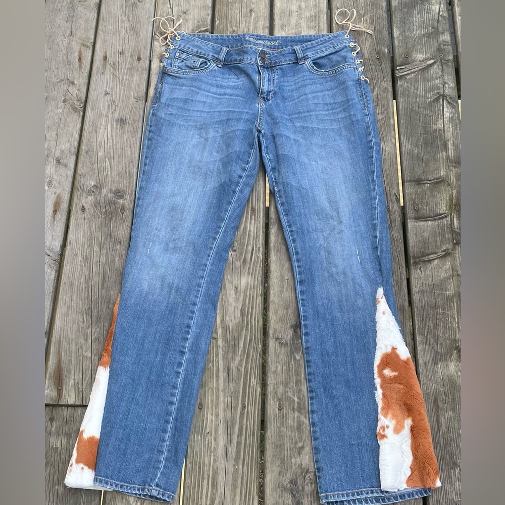 Custom made flare jeans with soft faux fur inserts in cow print